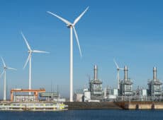 Multi fuel power station and wind turbine in a sea port.